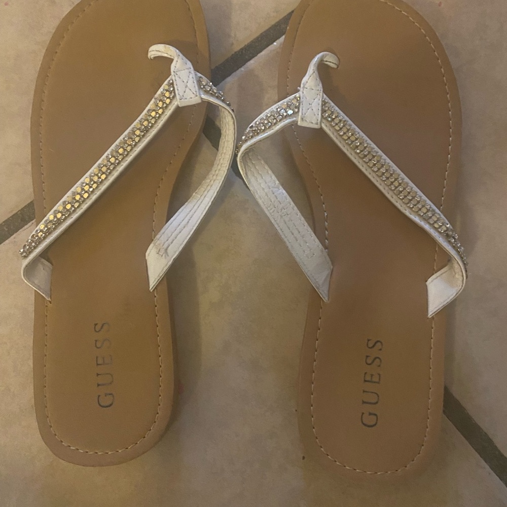 White guess flip flops